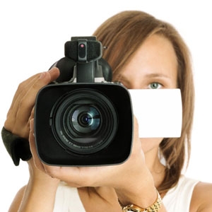 Young Woman With A Video Camera
